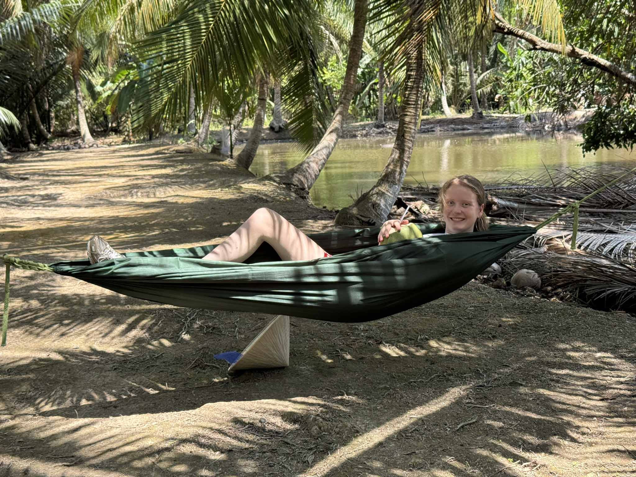 Mekong Delta tour - relaxing in a hammock under coconut palms