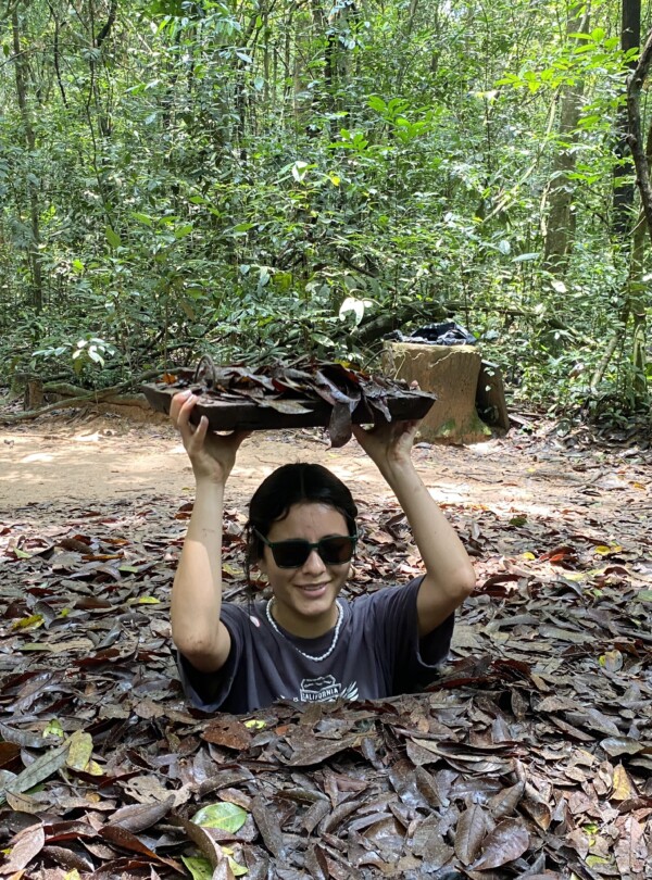 Tourist exploring the Cu Chi Tunnels