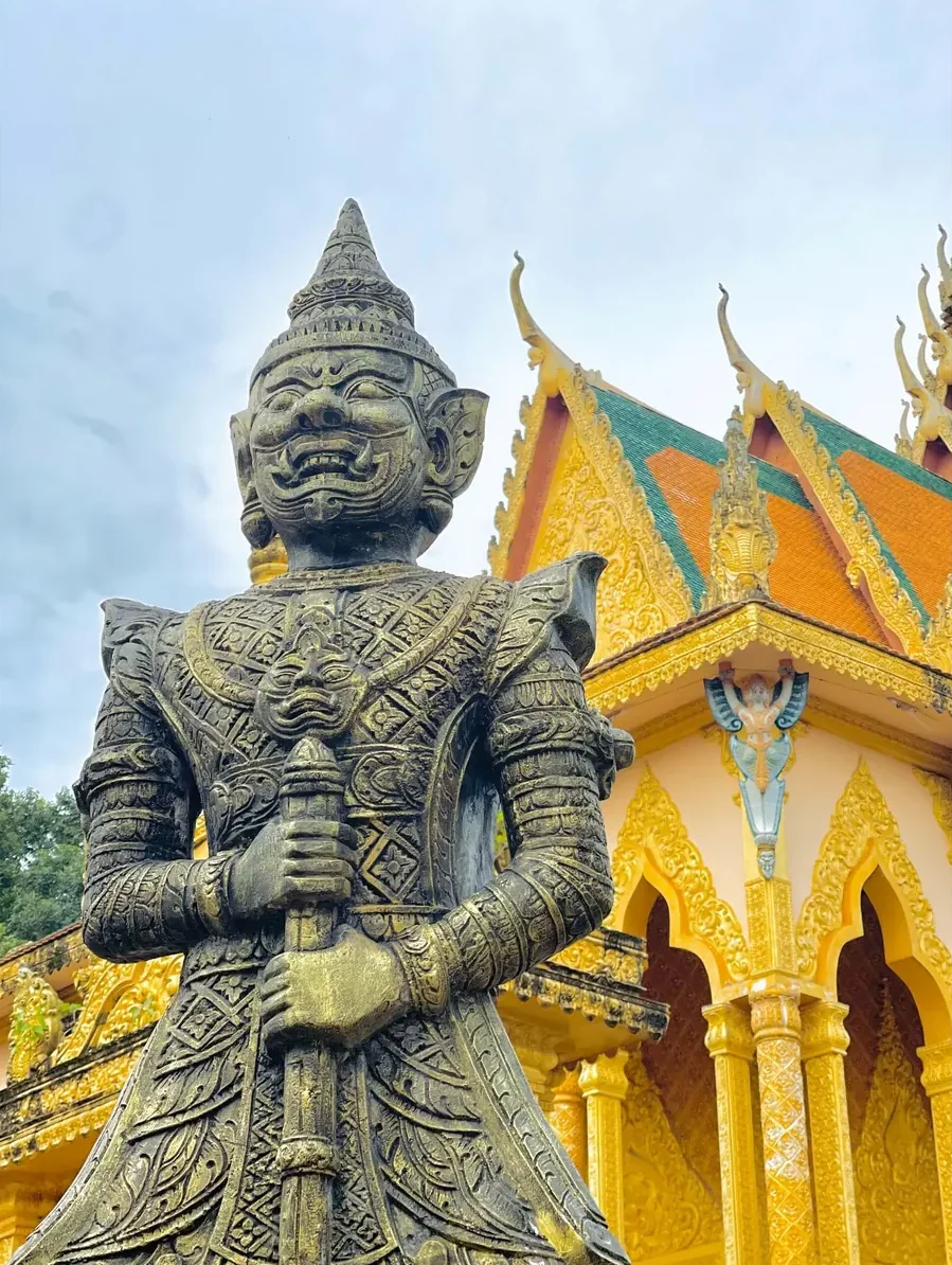 Guardian statue at a Khmer pagoda in the Mekong Delta